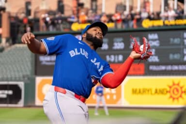 Toronto Blue Jays first baseman Vladimir Guerrero Jr. (27) catches a pop fly during the eighth inning at Oriole Park at Camden Yards.