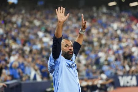Jose Bautista former Toronto Blue Jays waves to the fans during a pregame celebration before a game between the Toronto Blue Jays and Seattle Mariners at Rogers Centre.