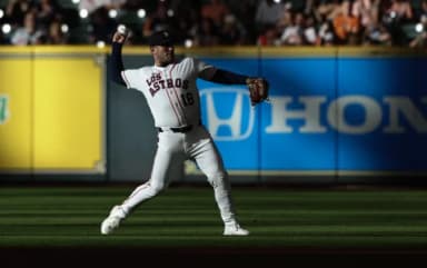 Houston Astros center fielder Daulton Varsho (18) warms up before playing against the Atlanta Braves in the first inning at Daikin Park.