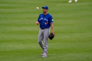 Toronto Blue Jays pitcher Max Scherzer (31) tosses the ball before the game at Oriole Park at Camden Yards.
