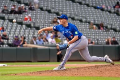 Toronto Blue Jays pitcher Paul Sewald (43) delivers a pitch during the eighth inning at Oriole Park at Camden Yards