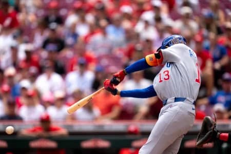 Chicago Cubs designated hitter Kevin Alcantara (13) hits an 2-run RBI base hit in the fourth inning between the Chicago Cubs and Cincinnati Reds at Great American Ball Park in Cincinnati on Sunday, July 12, 2026.
