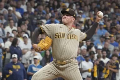 San Diego Padres pitcher Adrian Morejon (50) pitches against the Milwaukee Brewers during the seventh inning at American Family Field.
