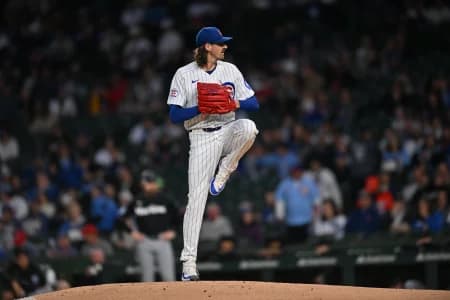 Chicago Cubs pitcher Kevin Gausman (12) pitches against the Miami Marlins during the first inning at Wrigley Field.