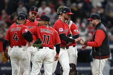Cleveland Guardians manager Stephen Vogt (12) takes the ball from pitcher Foster Griffin (22) during the fifth inning against the Tampa Bay Rays in game four of the ALCS for the 2026 MLB Playoffs at Progressive Field.